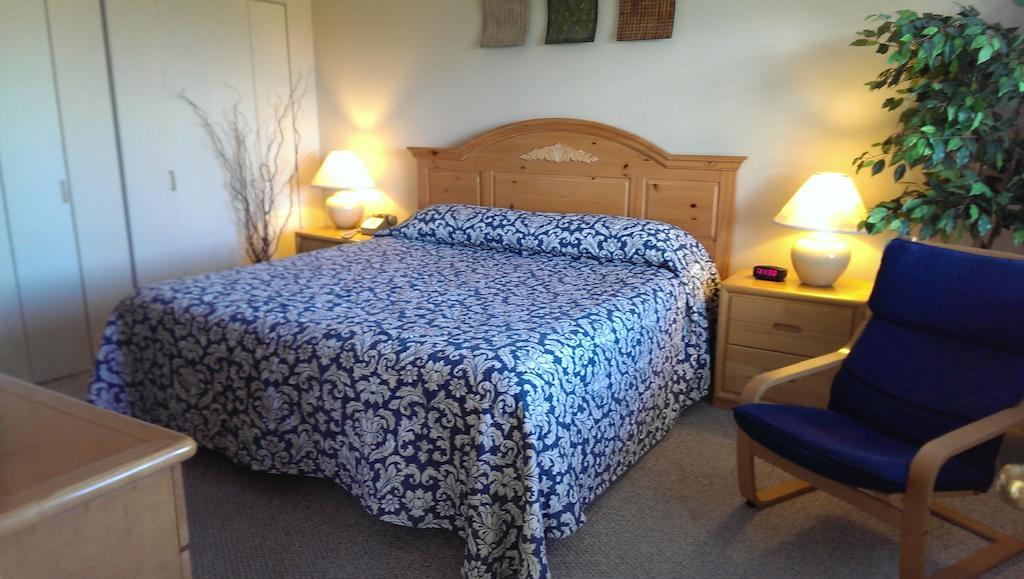 Montauk Manor Hotel Værelse billede A bed with a duvet